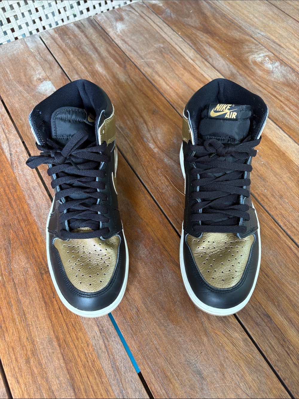 Air Jordan High-Top Sneakers in Black and Gold